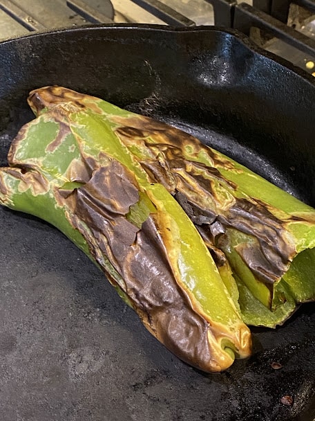 roasted green chiles in cast iron skillet