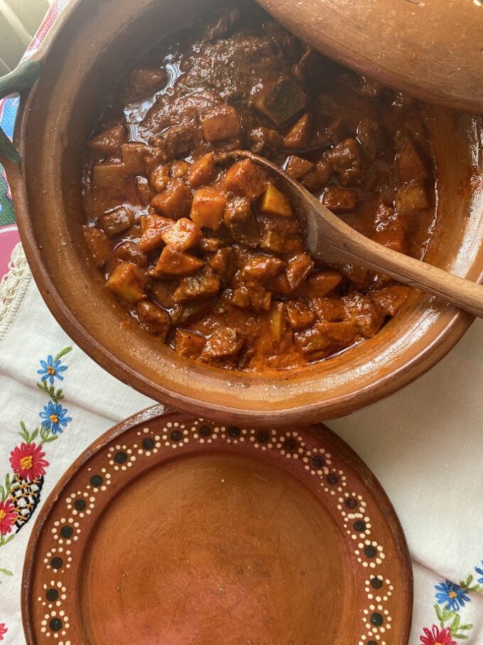 beef in red chili in a Mexican cazuela