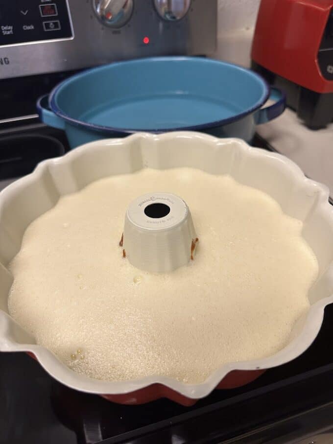 unbaked flan in bundt pan