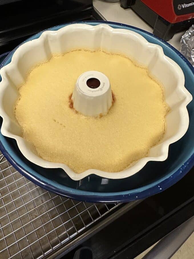 baked flan just out of the oven still in water bath