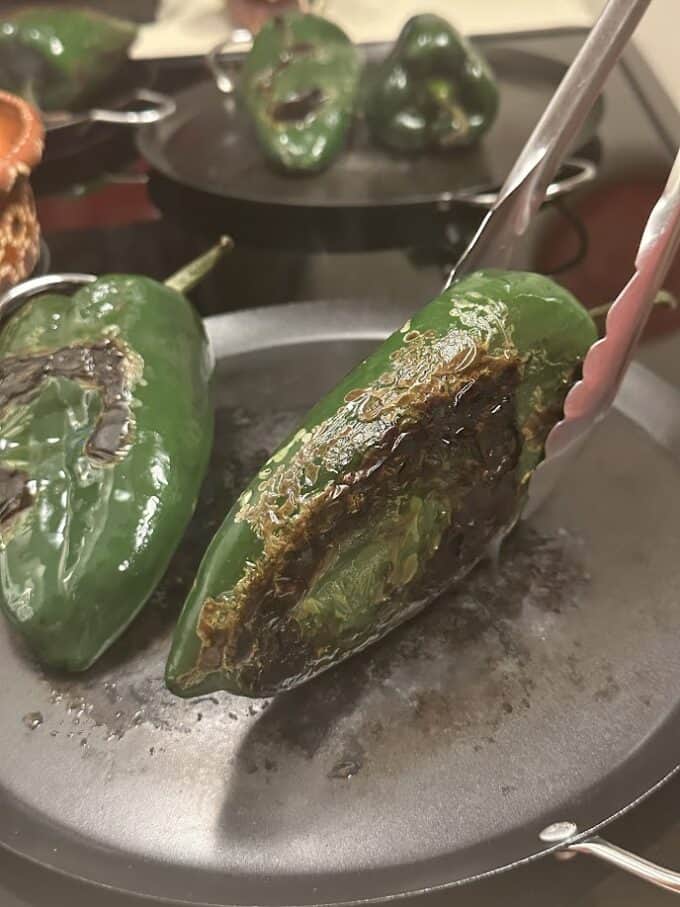 roasting chiles on a comal, griddle