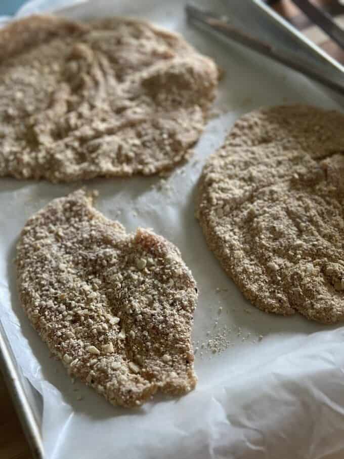 thin chicken breast coated with cracker meal