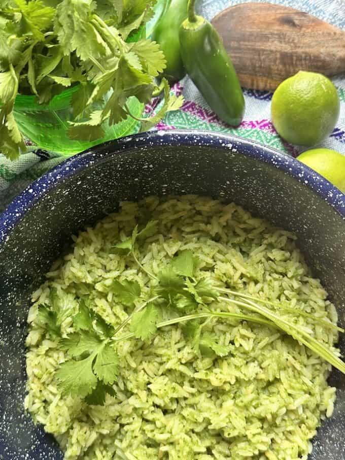 arroz verde close up in pot with cilantro sprigs