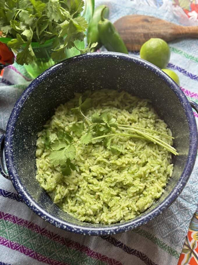 arroz verde in the pot with cilantro sprigs
