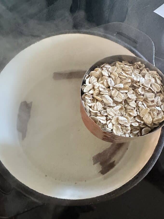 adding oats to water