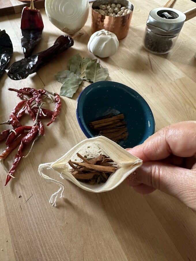 adding spices to spice bag