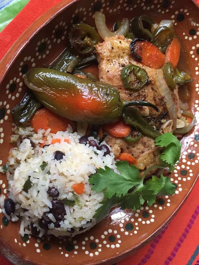 chciken escabeche plated with rice
