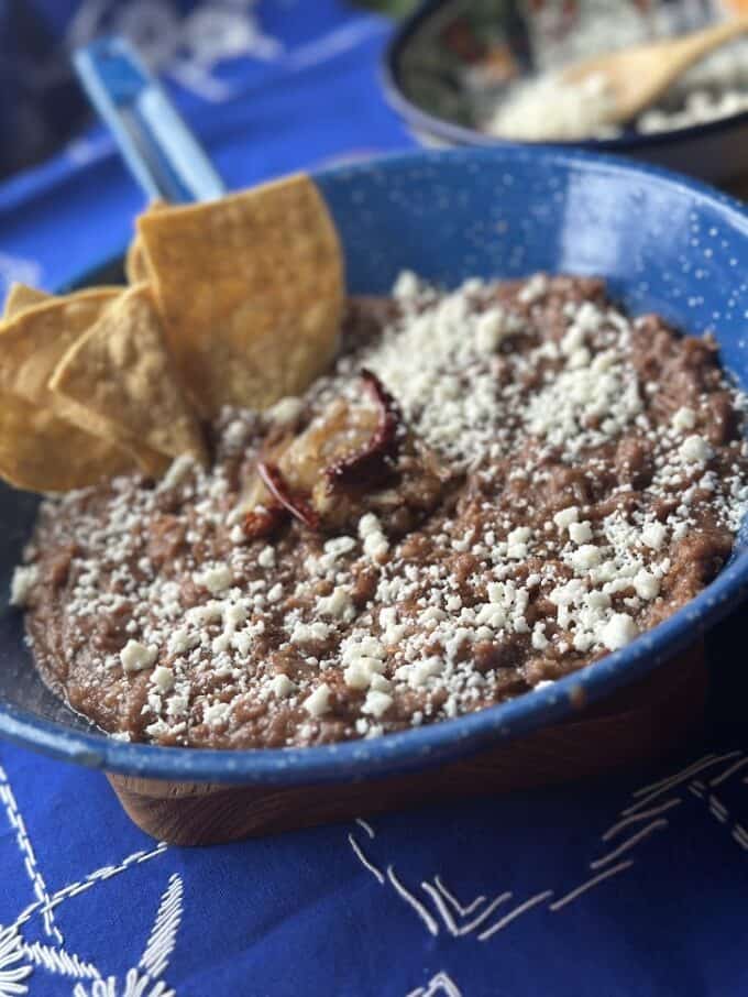 refried beans with queso fresco on top