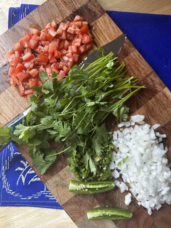 fresh ingredients, tomato, cilantro, serrano peppers, onion