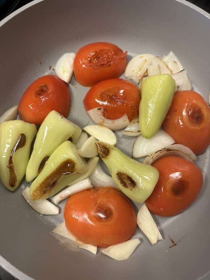 tomatoes, chiles, onion and garlic sauteed in oil