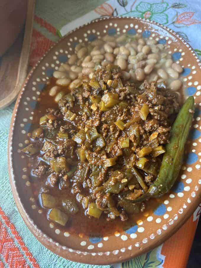 beef plated with whole pinto beans