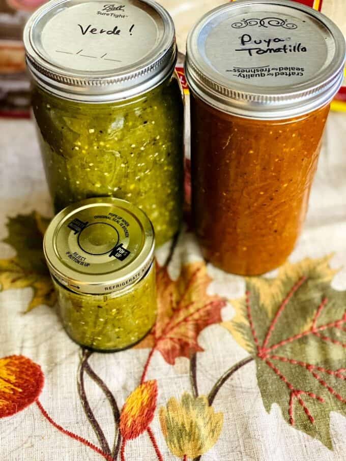 chile puya and roasted salsa verde in jars