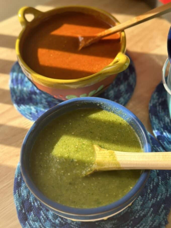 salsa verde and salsa roja in separate bowls