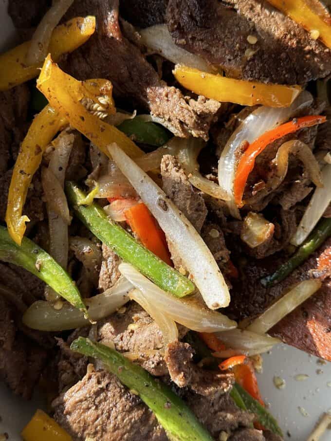 beef fajitas with peppers and onions