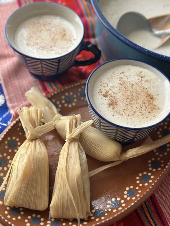 atole served in large cup with sweet tamales