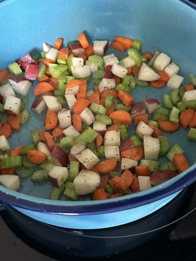 carrots, celery and potatoes in pot
