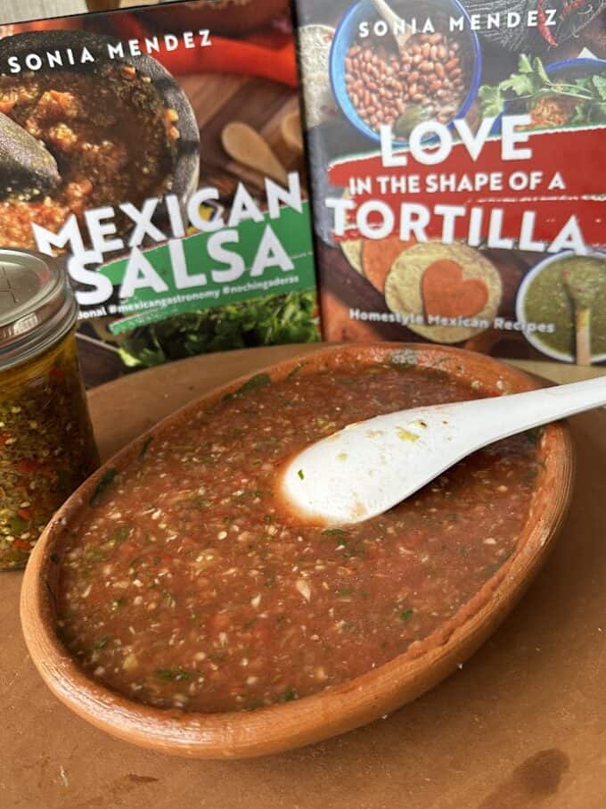 salsa in shallow bowl. My cookbooks in the back