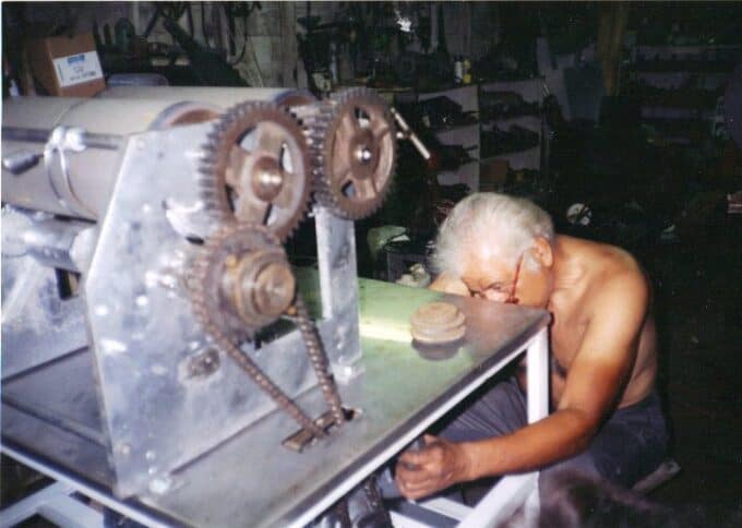 dad working on one of the many pieces of tortilla machinery